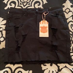 black ripped skirt